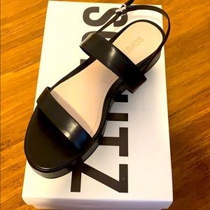 Schutz black sandals. Never worn. New with box.